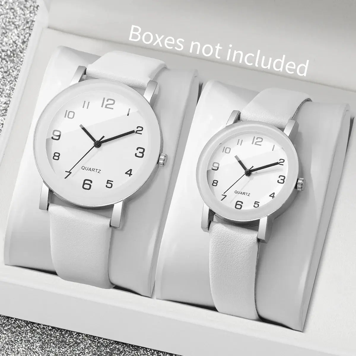 Simples Market couple's watches set: two white leather-strap quartz watches with Arabic dials for him and her.