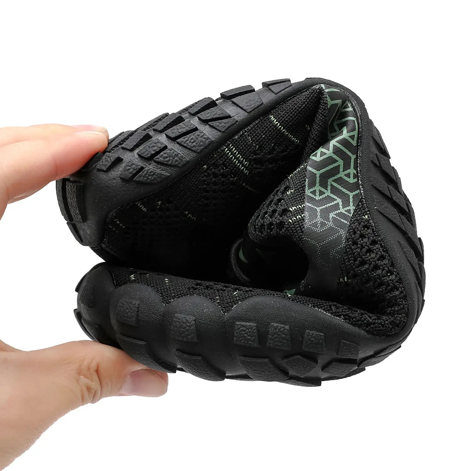 Men's trail running shoe in black with rugged square-tread outsole and breathable knit upper