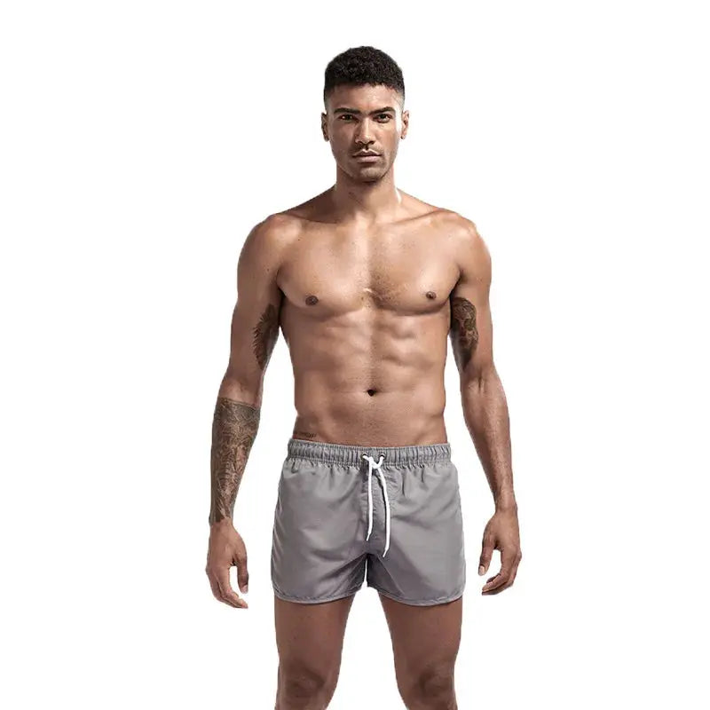 Men's gray quick-dry swim trunks with white drawstring