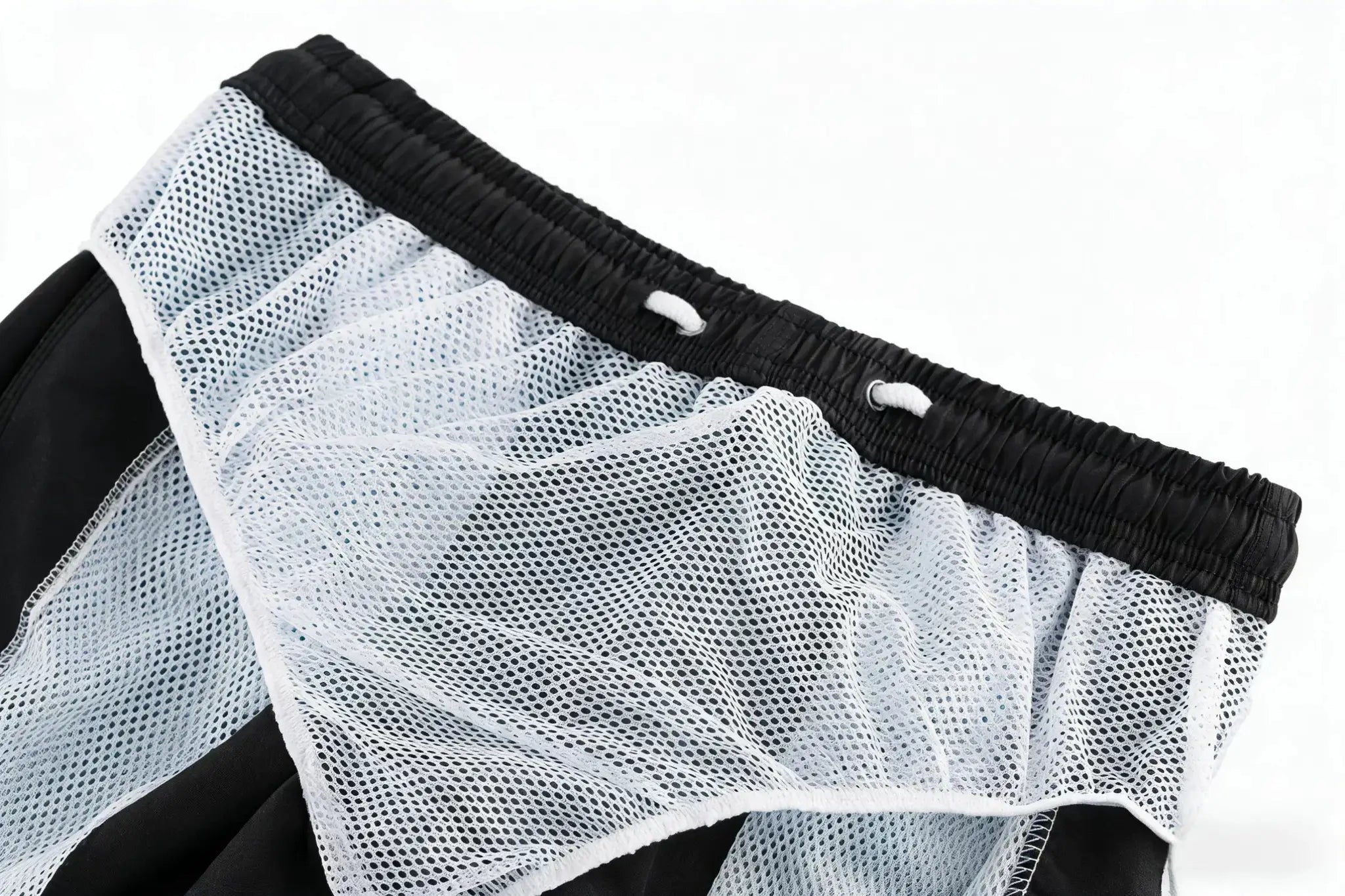 Simples Market men's swim trunks with black elastic waistband and white mesh lining
