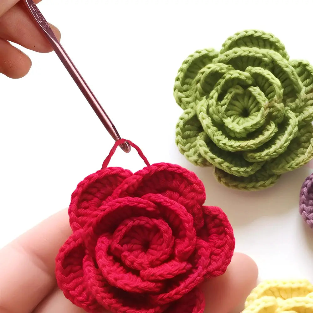 8-piece metal-handle crochet hook set with colorful aluminum hooks and crocheted flowers
