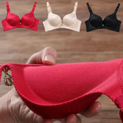 Push-up bra set with three wire-free, seamless padded bras in red, beige, and black from Simples Market.