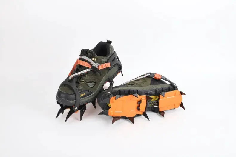 Simples Market 12-tooth ice crampons with orange clips and stainless steel spikes