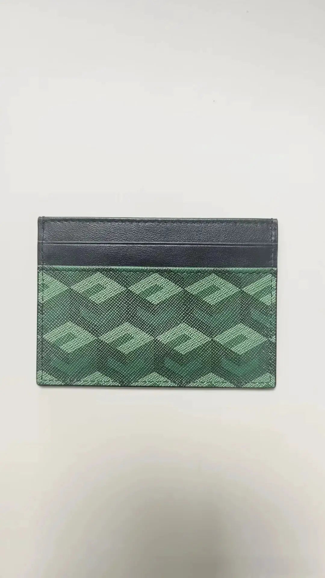 Card holder in two-tone navy and green genuine leather with geometric diamond pattern