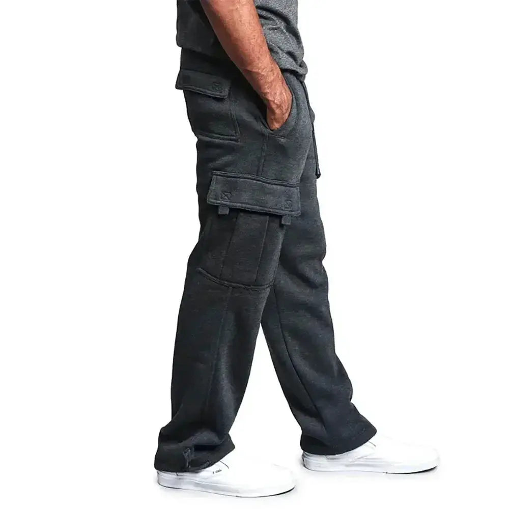 Men's black cargo sweatpants with multiple side pockets and a loose jogger fit