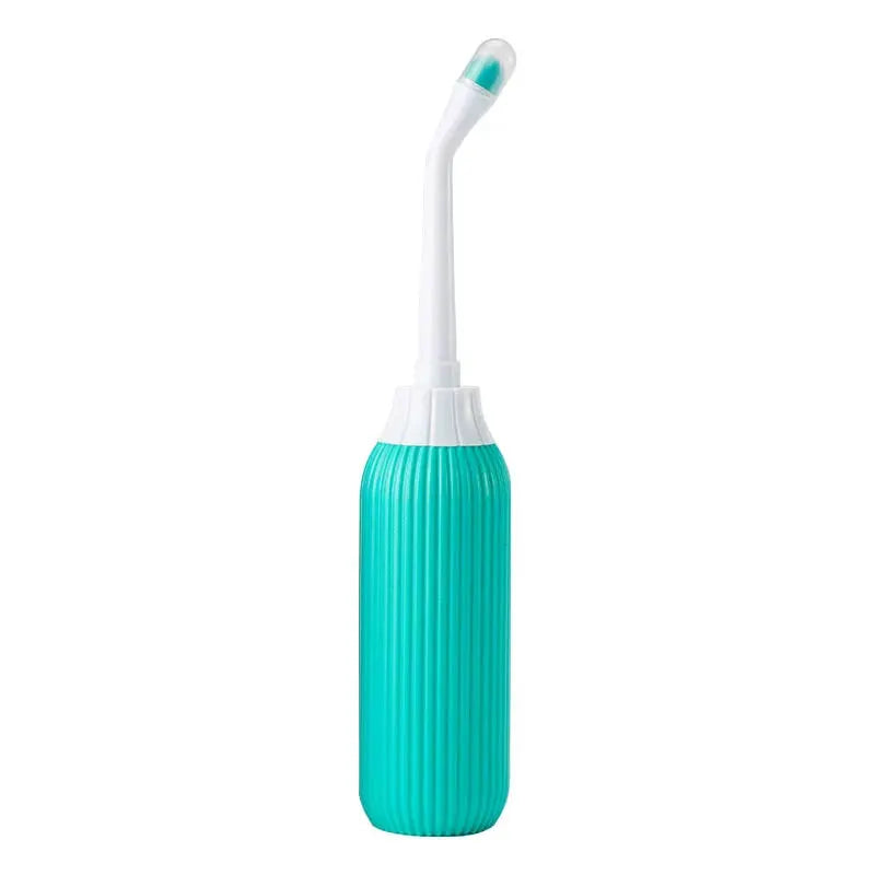 Portable teal ribbed bidet with white spray nozzle for feminine perineal cleansing