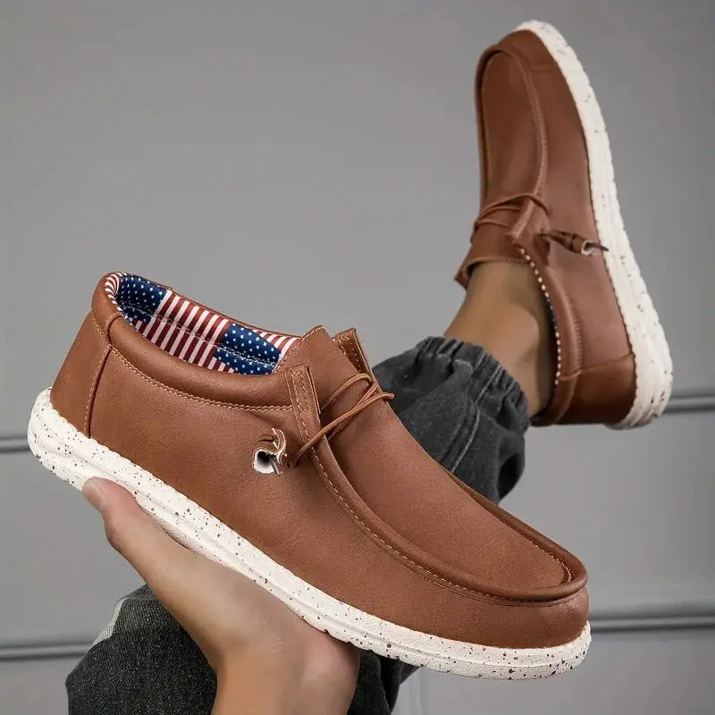 Simples Market men's brown leather loafers with white speckled sole and American flag-lined interior, 2 shoes shown.