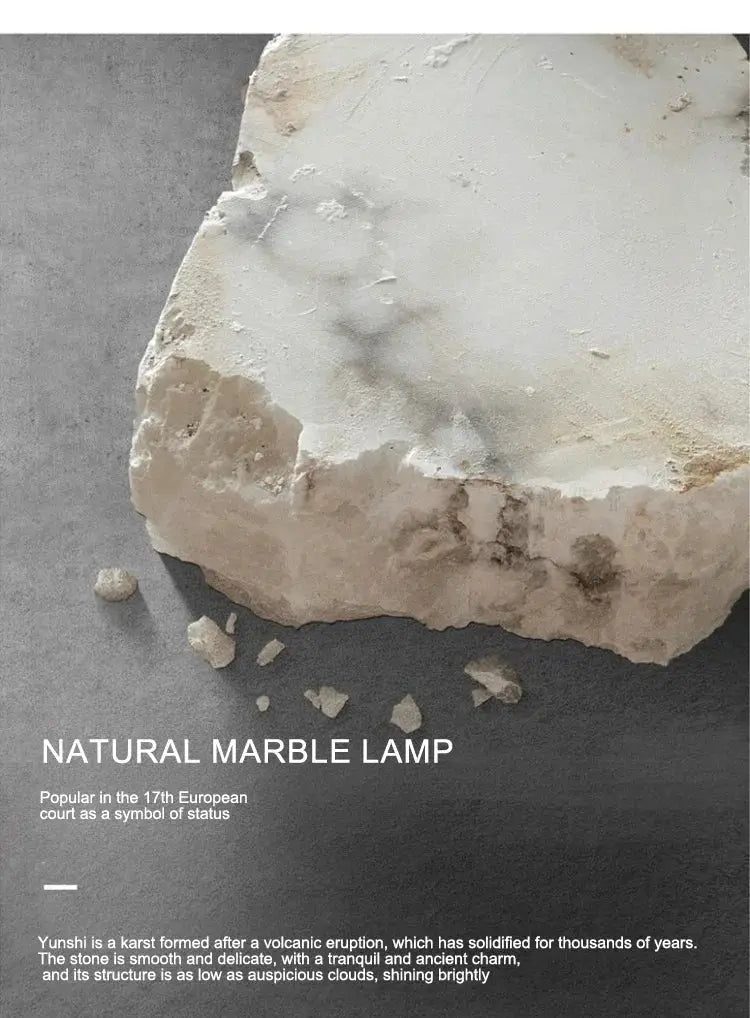 Natural marble lamp; close-up of alabaster white marble slab with text overlay