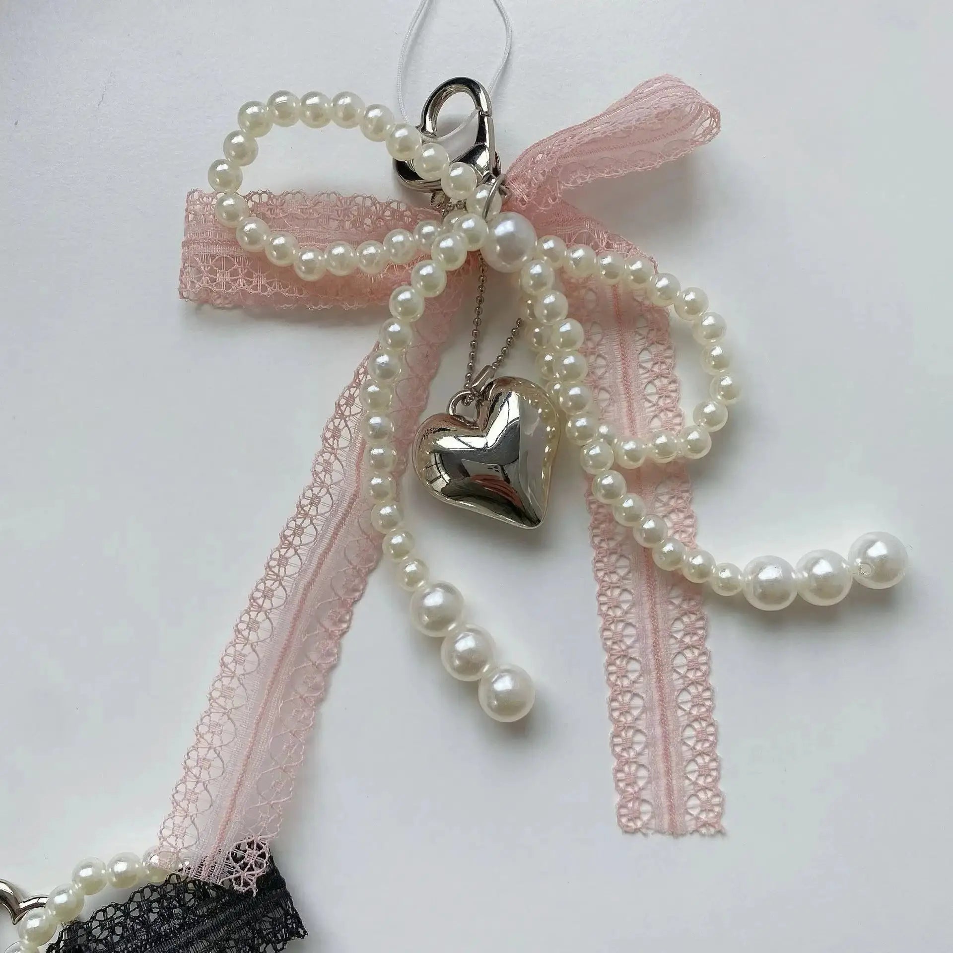Y2K imitation pearl bead keychain with pink lace bow and silver heart charm