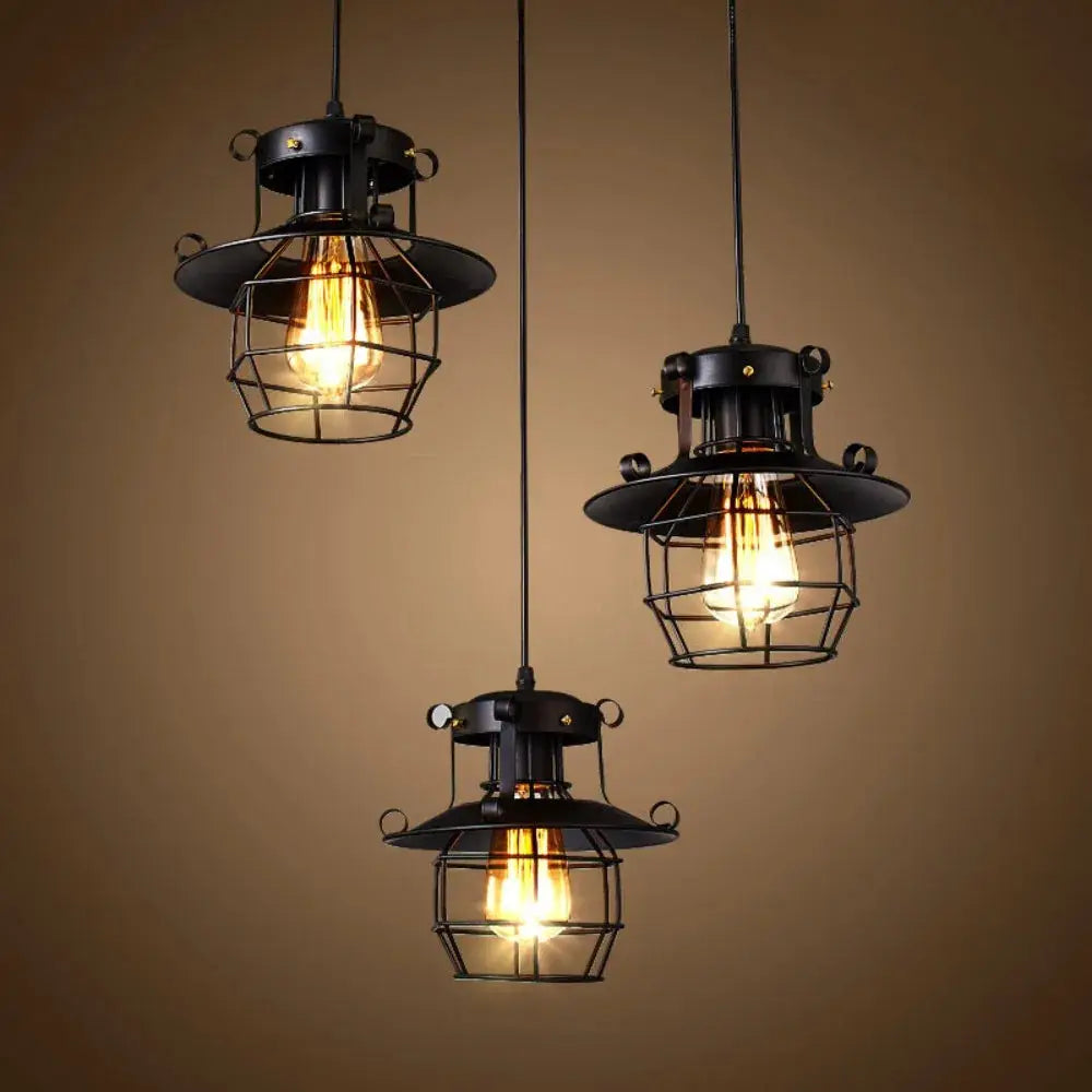 Industrial restaurant chandelier pendant lights, three black metal cage fixtures with Edison bulbs