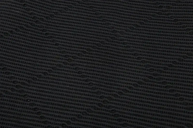 Men's black body shaper waist cincher fabric texture close-up, abdomen compression shapewear