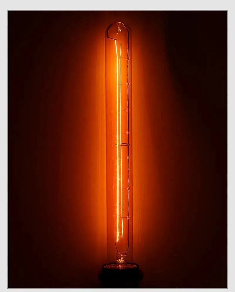 Retro Edison bulb, warm orange glow, vintage filament lamp for bedroom decor