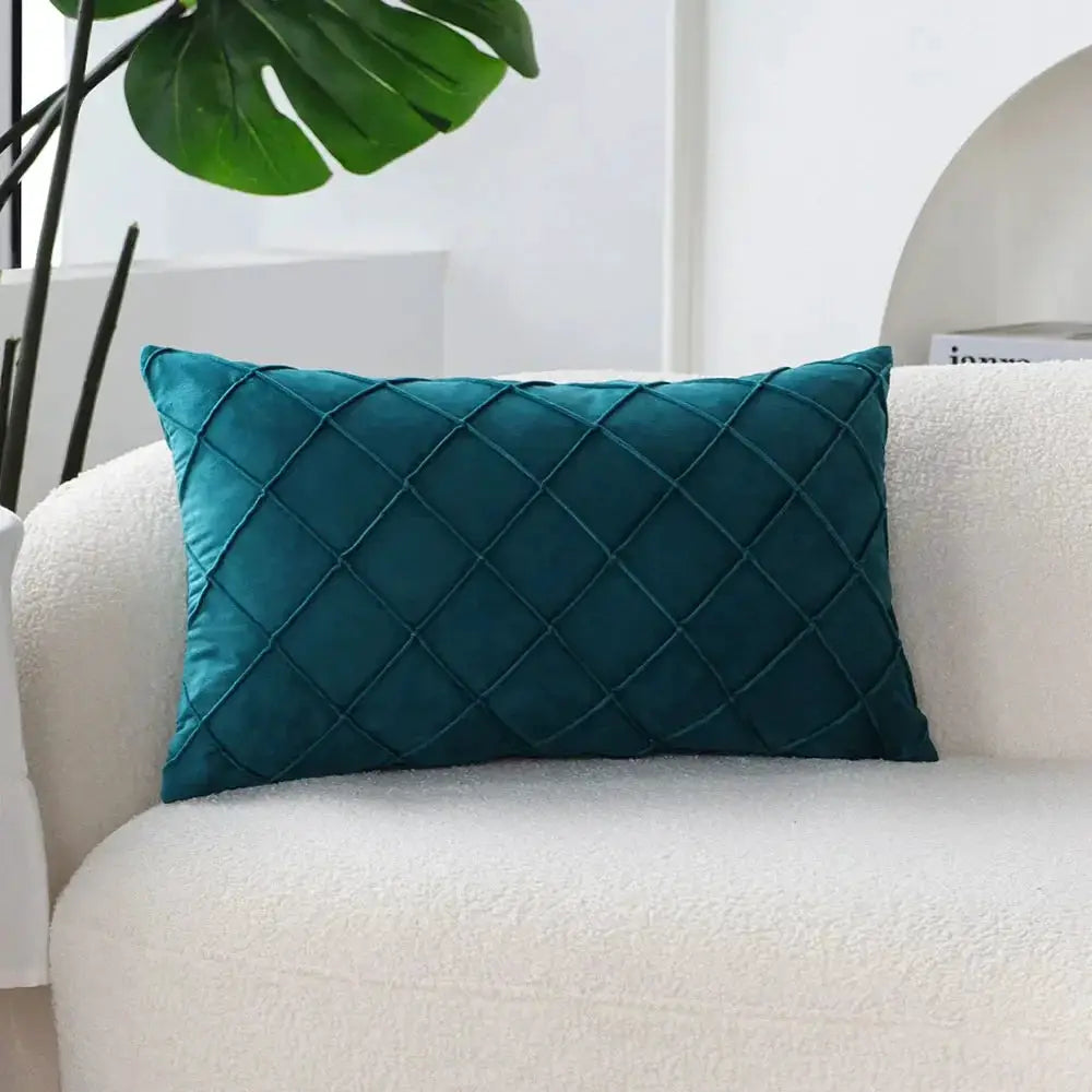 Pillow cover 30x50 teal quilted rectangle on white sofa