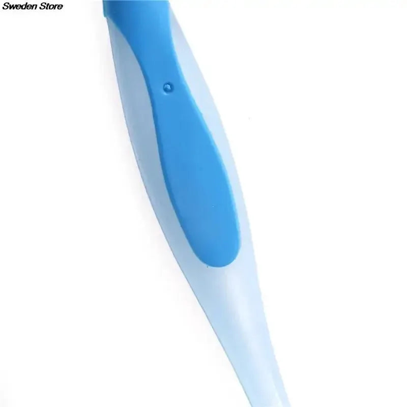 Pot cleaning brush by Simples Market with long vertical handle and blue grip; suction-cup sink scrub