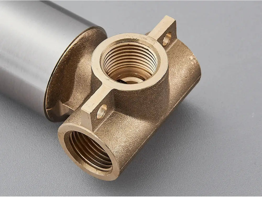 Brass mixer valve body for bathroom taps with two threaded outlets and wall flange