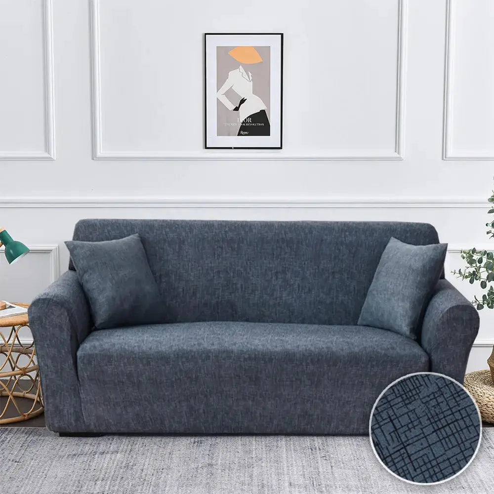 Stretch sofa slipcover for 2–3 seat sofa in dark blue-gray fabric with textured crosshatch weave
