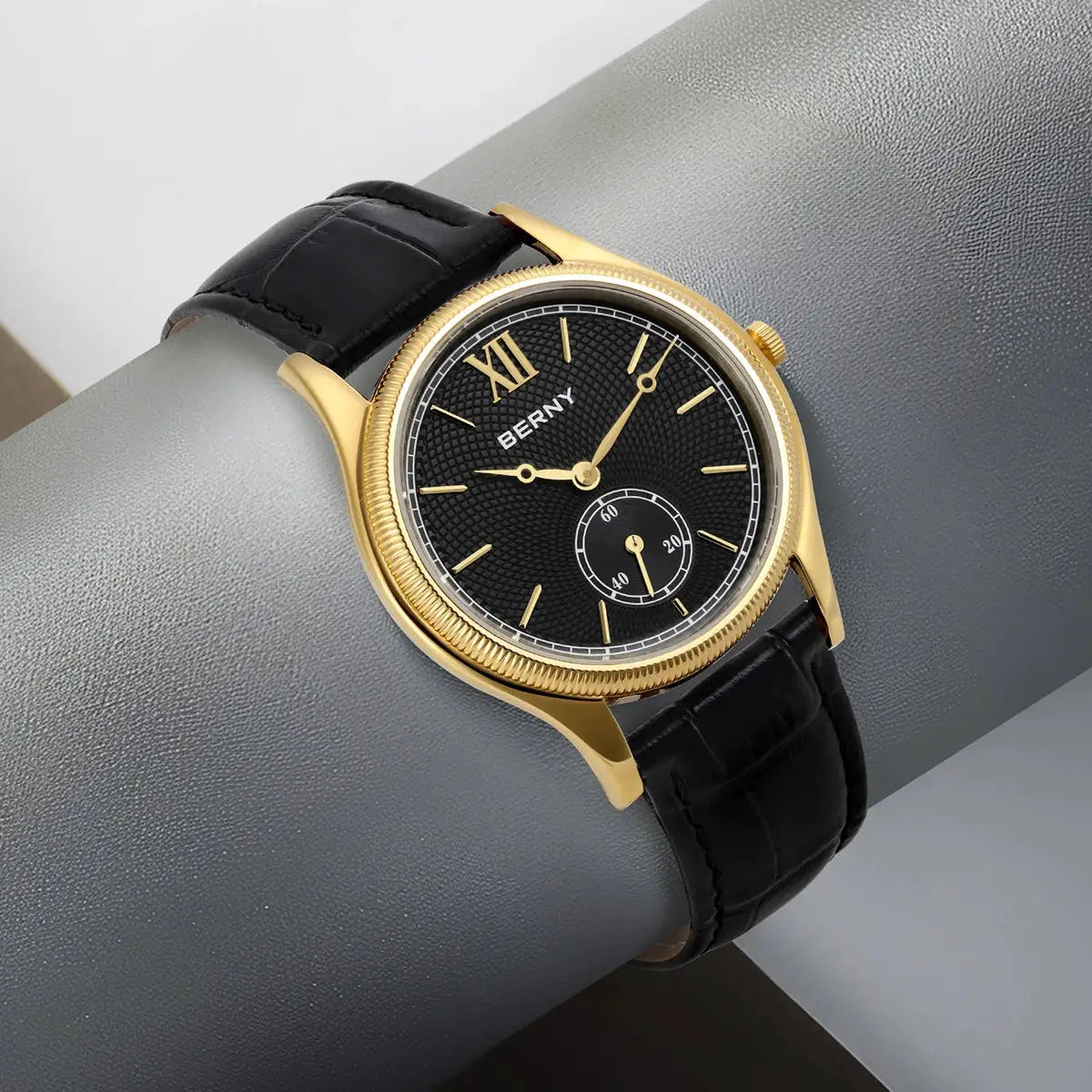 BERNY men's luxury watch with gold-tone case, black textured dial and black leather strap