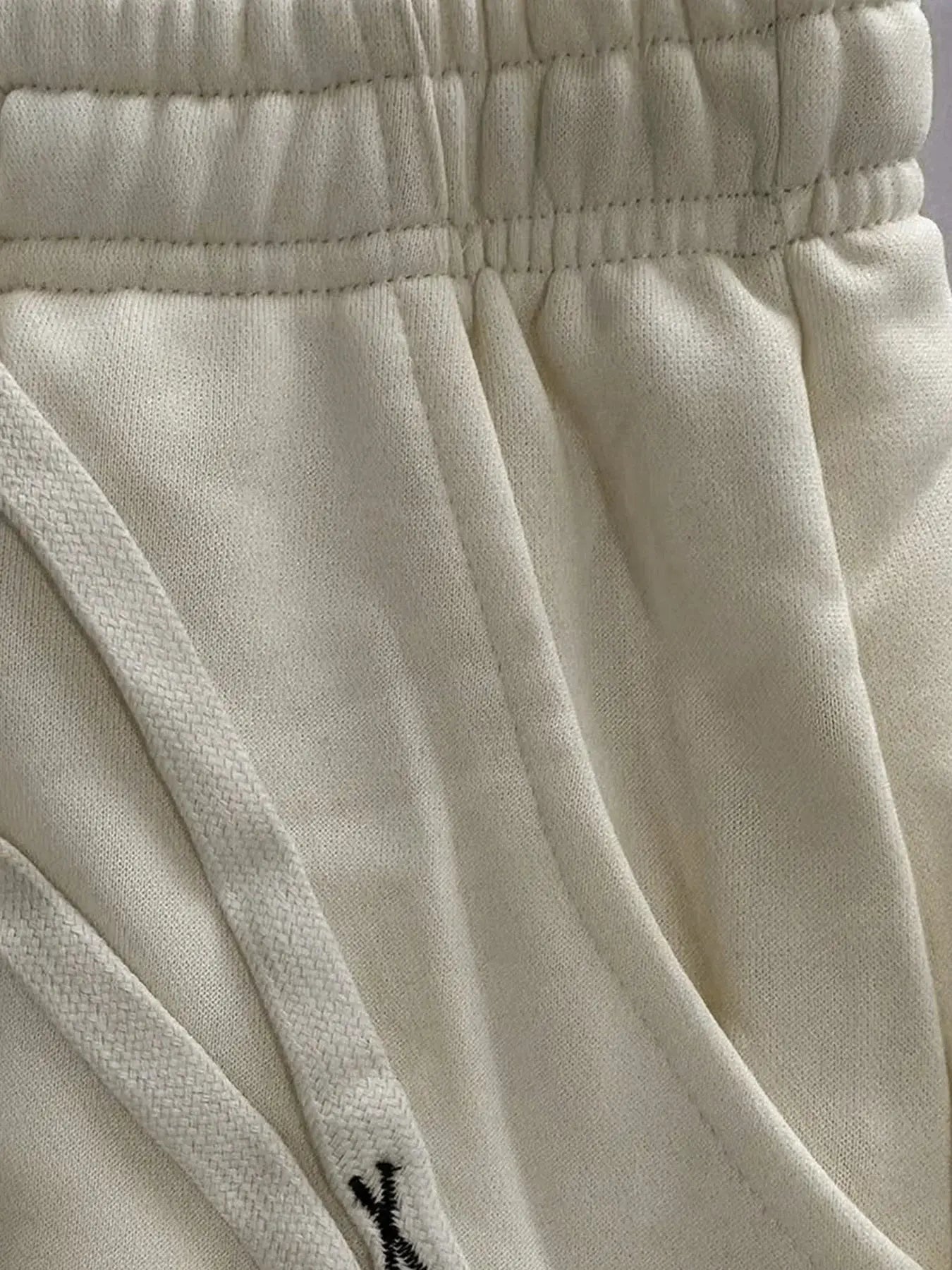 Men's beige baggy jogger pants with drawstring waist, breathable Simples Market sweatpants