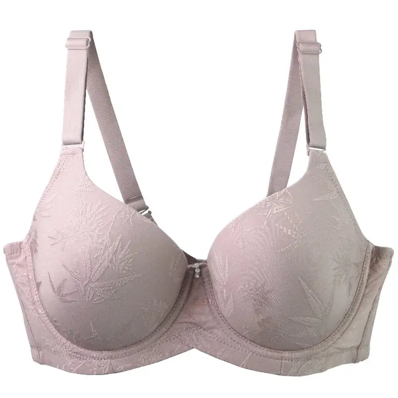 Pink floral-embroidered push-up bra for women with adjustable straps and full cups.