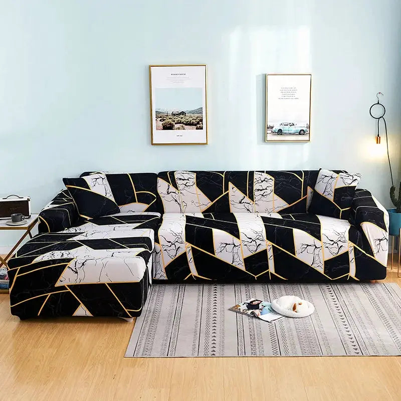 Elastic sofa slipcover for L-shaped corner sofa with black and white marble pattern and gold lines; Simples Market.