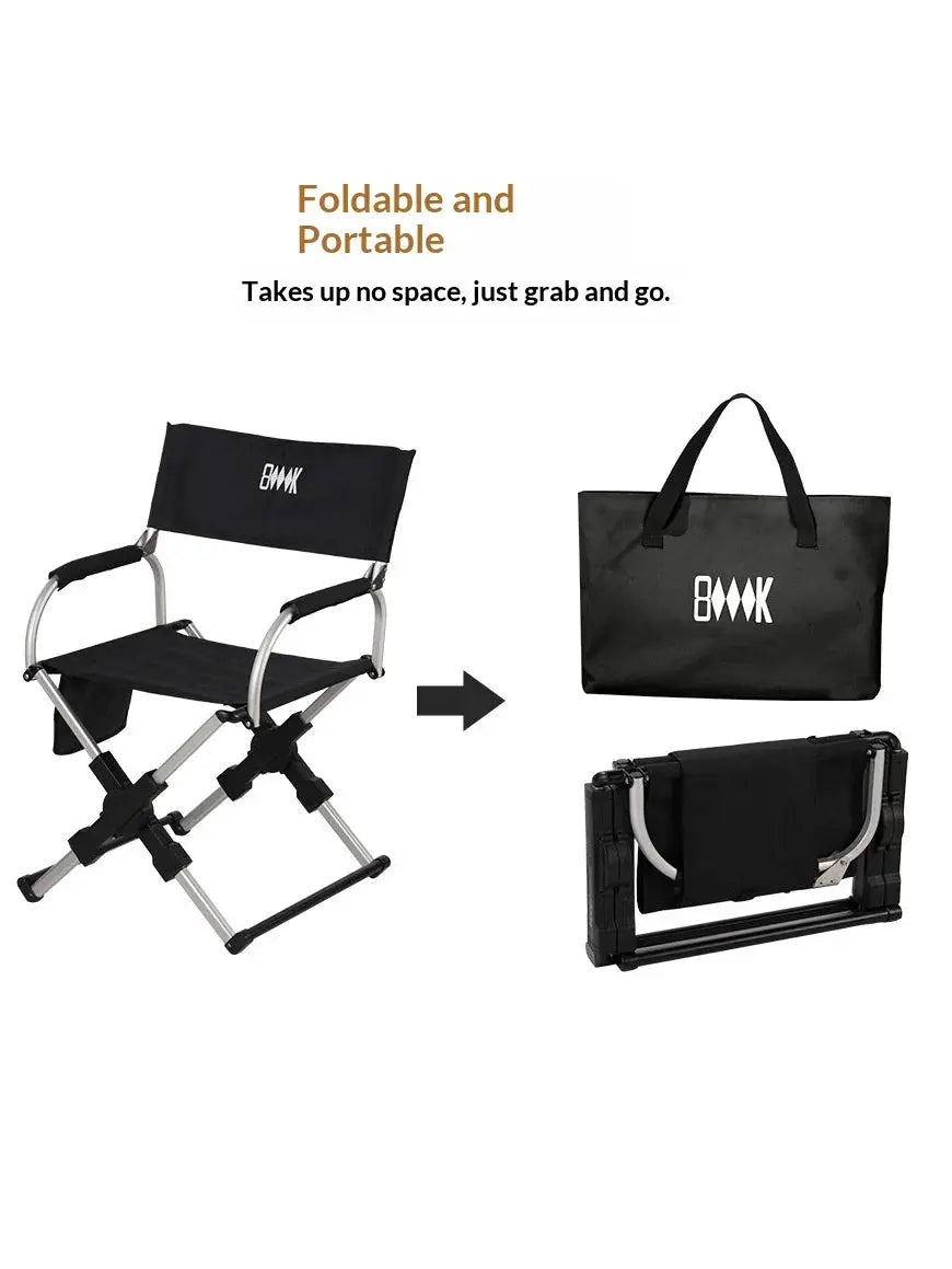 Outdoor foldable director chair with aluminum alloy frame and black fabric, includes carry bag.