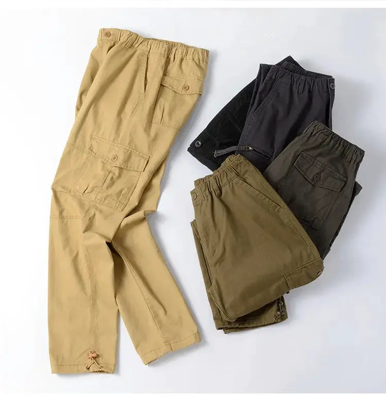 Men's tactical cargo pants with elastic waist and cotton fabric; large size, shown in tan, black, olive (5 pairs).