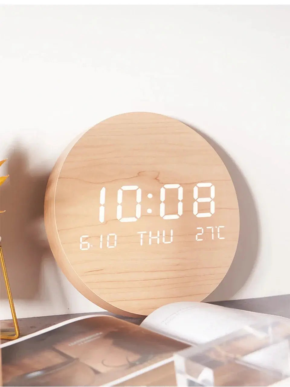 LED digital wall clock with round wooden finish displaying time, date, day and temperature