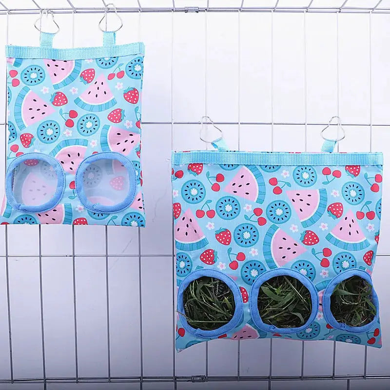 Rabbit hay bag, blue fruit-pattern hanging feeder with 2/3 hay holes, two bags shown