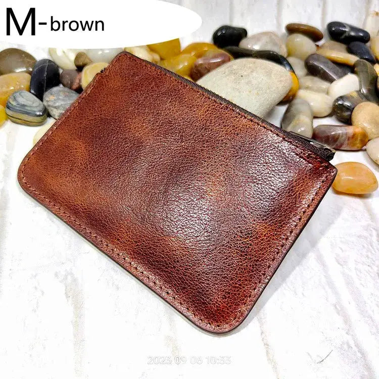 Mini zipper waist bag in brown leather; compact wallet and ID card holder