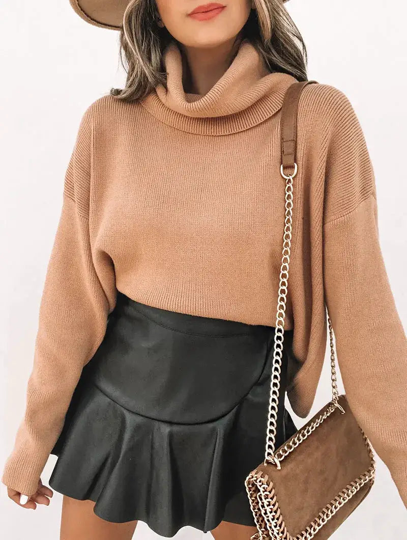 Women faux leather mini skirt with elastic high waist and pleated ruffle hem in black
