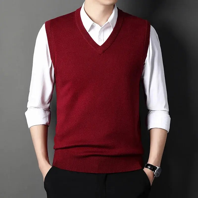 Men's burgundy V-neck knitted vest over white shirt, versatile casual top.