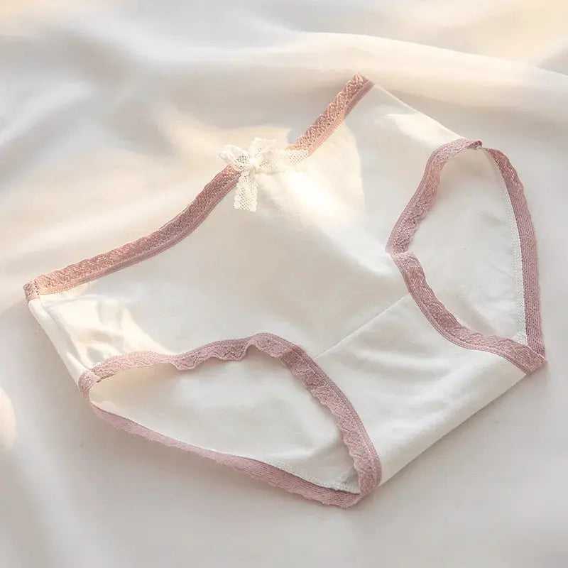 Cotton panties for women in white with pink lace trim and bow