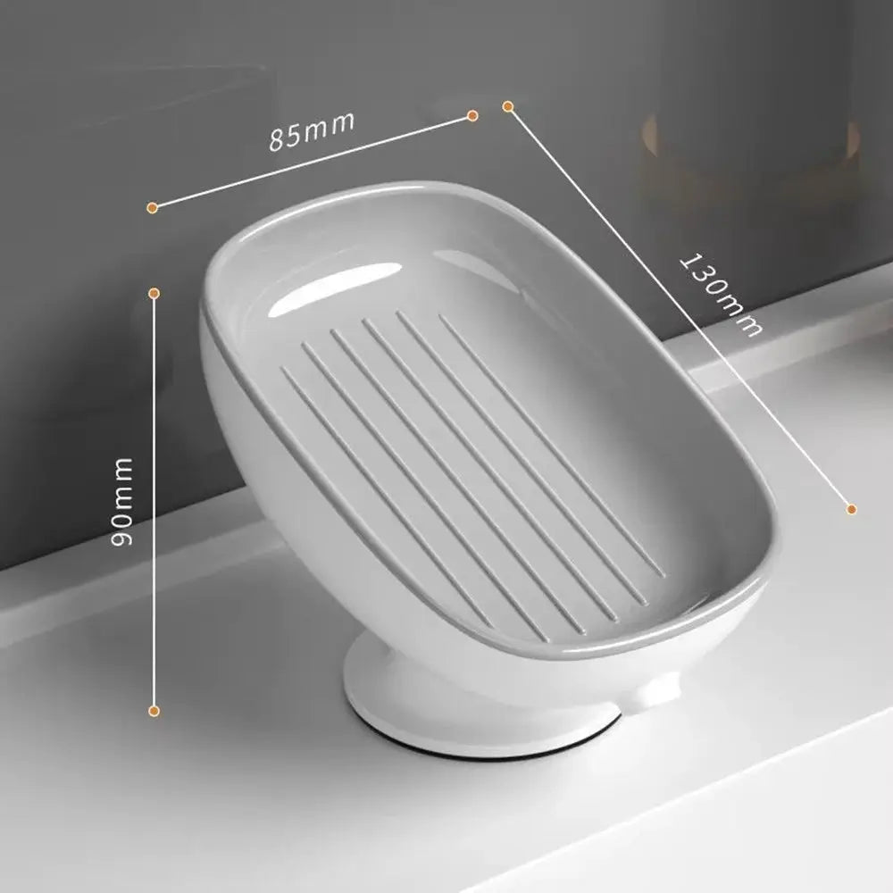 Soap holder with suction cup by Simples Market, white plastic bathroom accessory with drain.