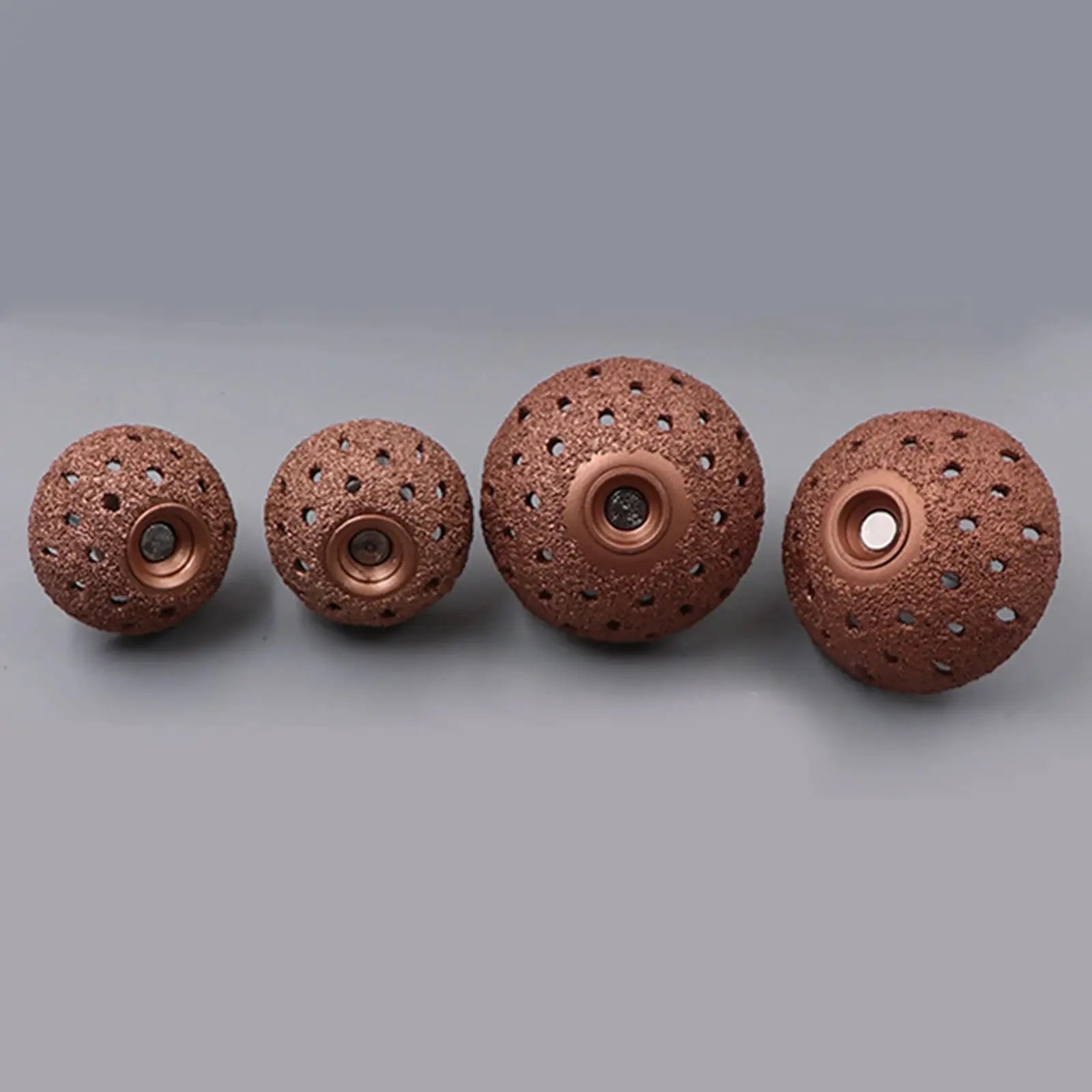 Tire grinding head set with four hemispherical tungsten-steel grinding wheels in copper-brown