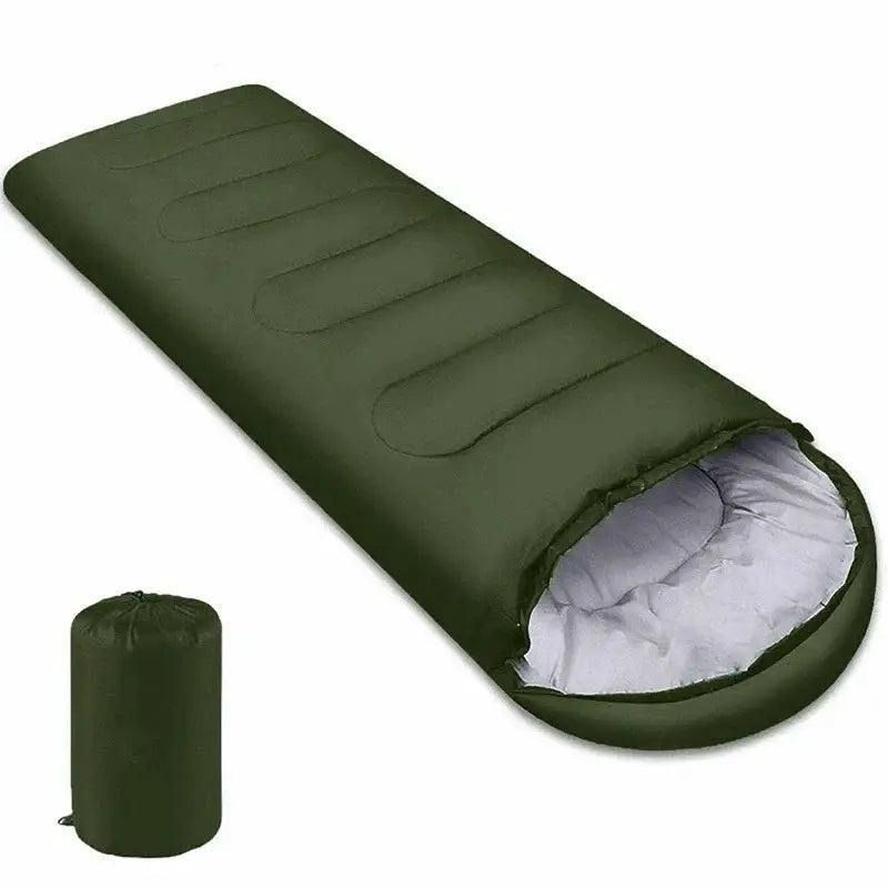 Camping sleeping bag by Simples Market, green envelope-style ultralight with gray inner lining and carry sack