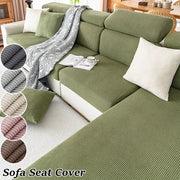 Sofa seat cover set by Simples Market in thick jacquard green; removable with color swatches.