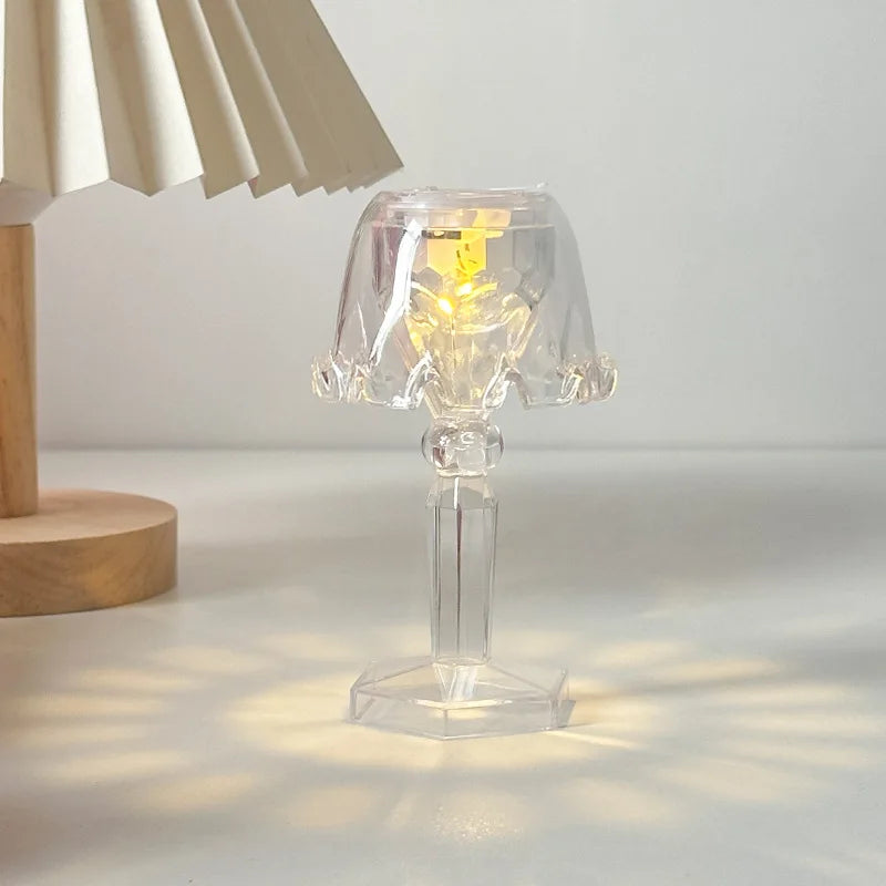 Mini crystal table lamp with color-changing LED, battery-powered bedside night light.