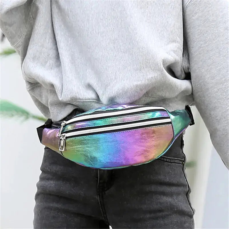 Holographic fanny pack by Simples Market, iridescent waist bag with dual zip pockets and adjustable belt.