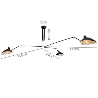 Modern Spider Grabbing Pendant Light by Simples Market; black metal ceiling lamp with multiple arms and warm LED bulbs.