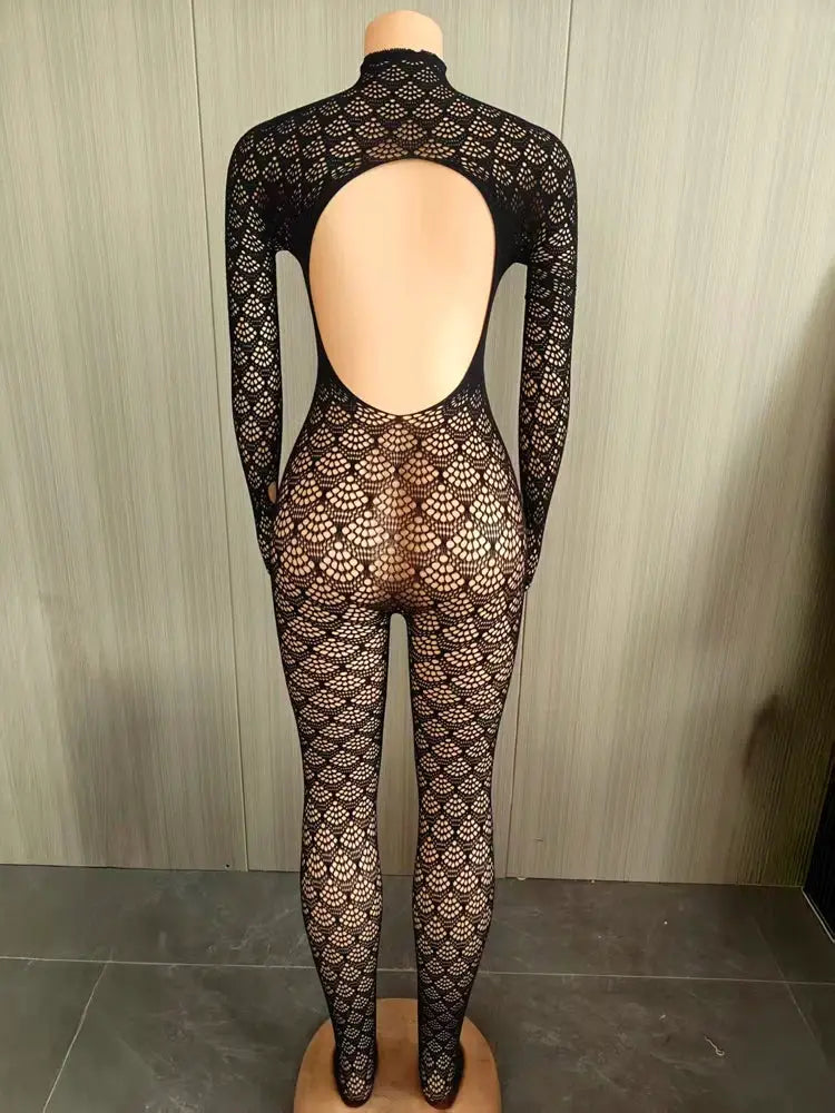 Women's black lace see-through mesh jumpsuit, open-back one-piece bodycon romper for night out.