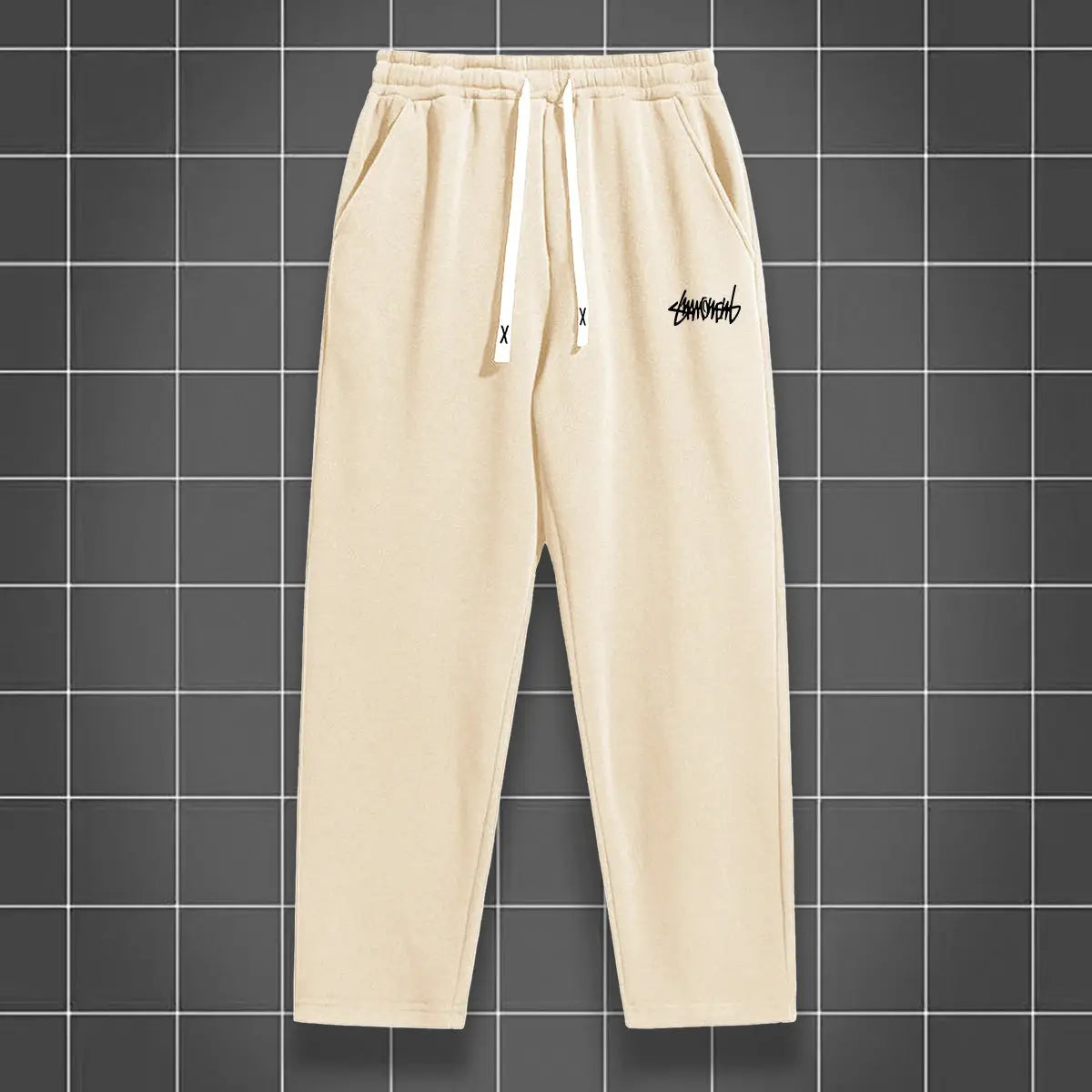 Men's beige solid-color straight-leg jogging pants with drawstring waist from Simples Market