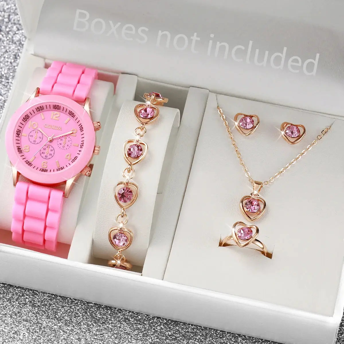 Pink silicone-band women's watch with a 5–6-piece rose-gold jewelry set featuring pink heart accents.