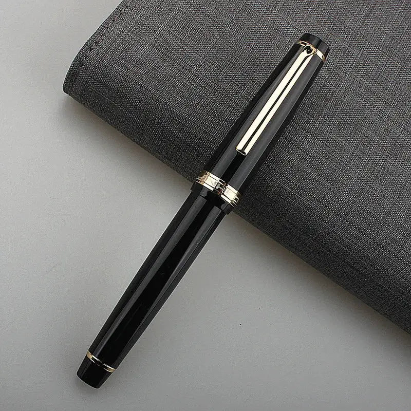 Jinhao 82 fountain pen in black acrylic with gold trim and cap clip