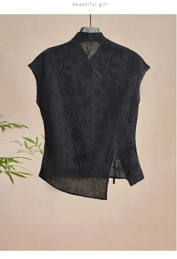 Cheongsam-inspired black jacquard top by Simples Market with short sleeves and sheer bamboo floral pattern, back view.