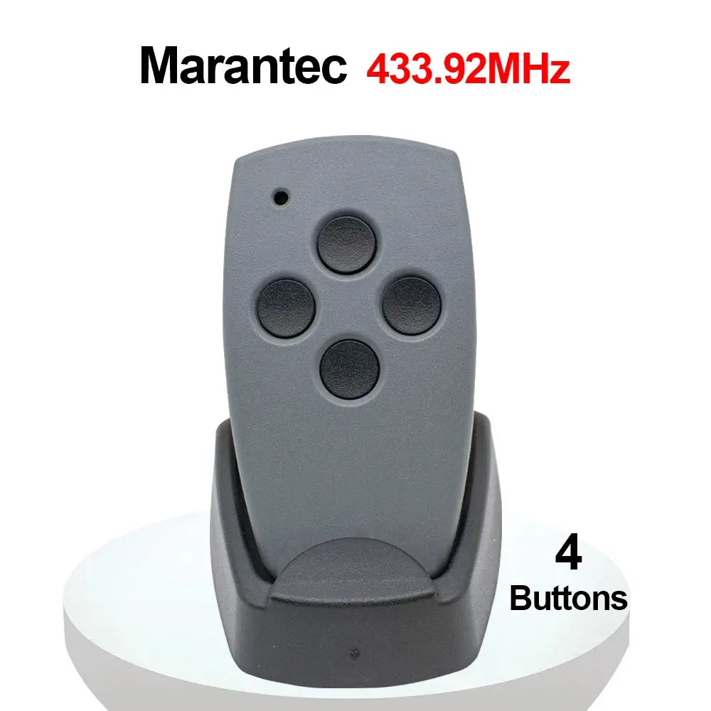 Garage door remote control with 4 gray buttons on a charging dock, 433.92MHz