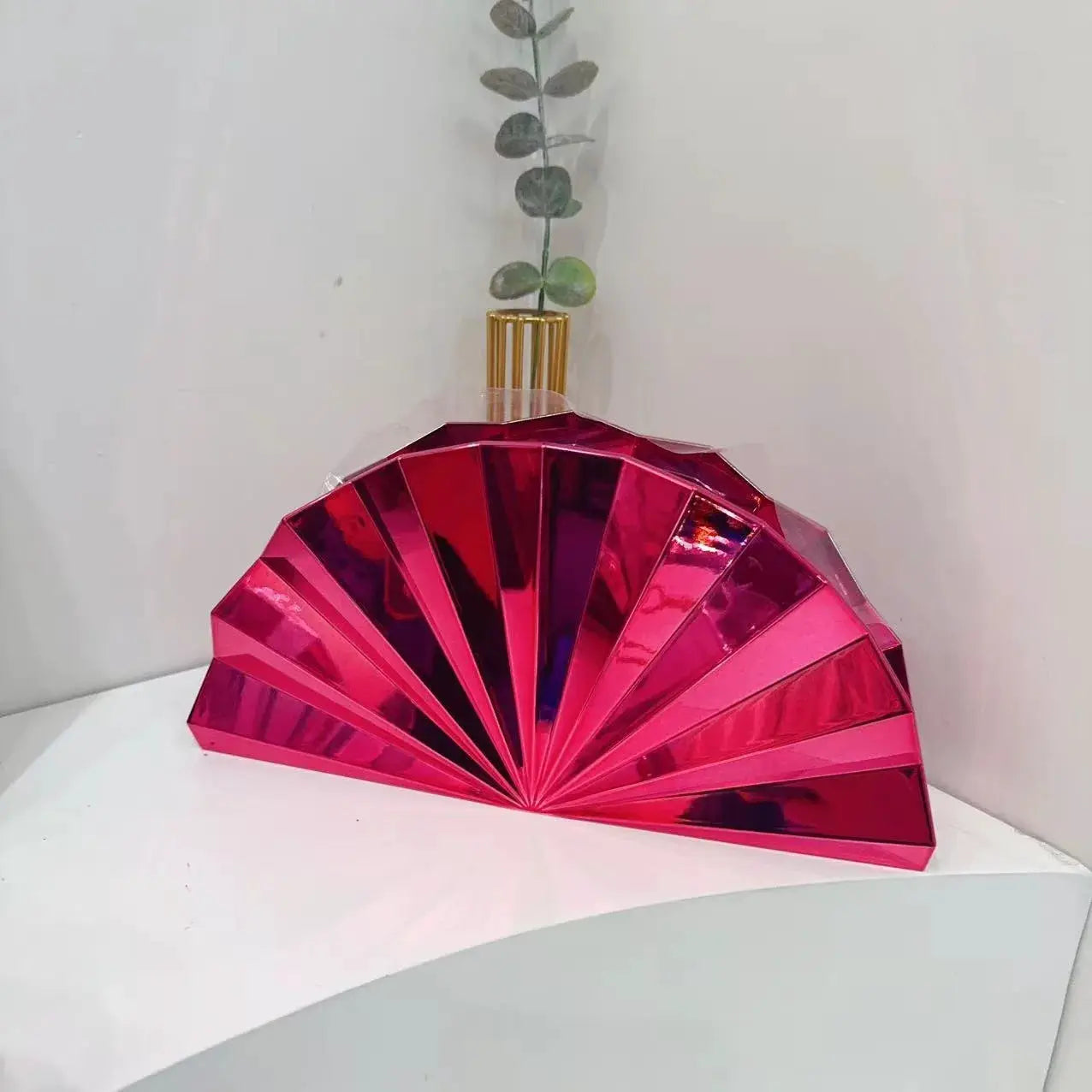 Pink metallic fan-shaped acrylic box bag with gold-tone hardware