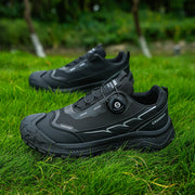 Men's black CHUANBA athletic sneakers, low-top lace-up, lightweight breathable design on grass