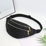 Women's quilted black waist bag by Simples Market with gold zippers and adjustable strap.