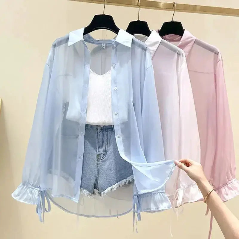 Three pastel chiffon blouses for women in blue, white, and pink; button-up with long sleeves.