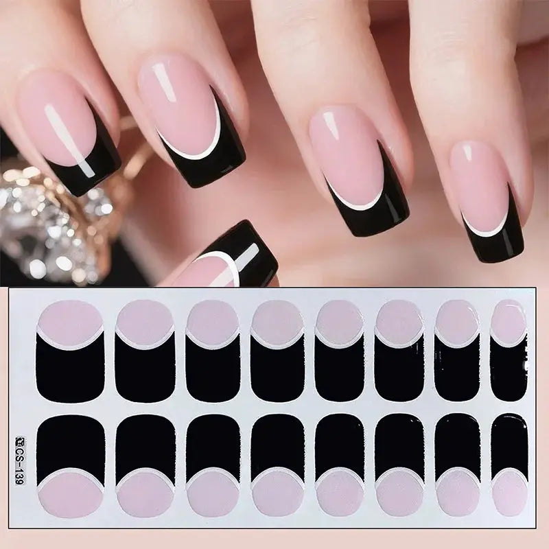 Full-cover nail stickers by Simples Market; black tips over pale pink base with white curved accents.